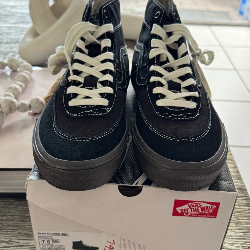 Vans Black and White High-Top Skate Shoes